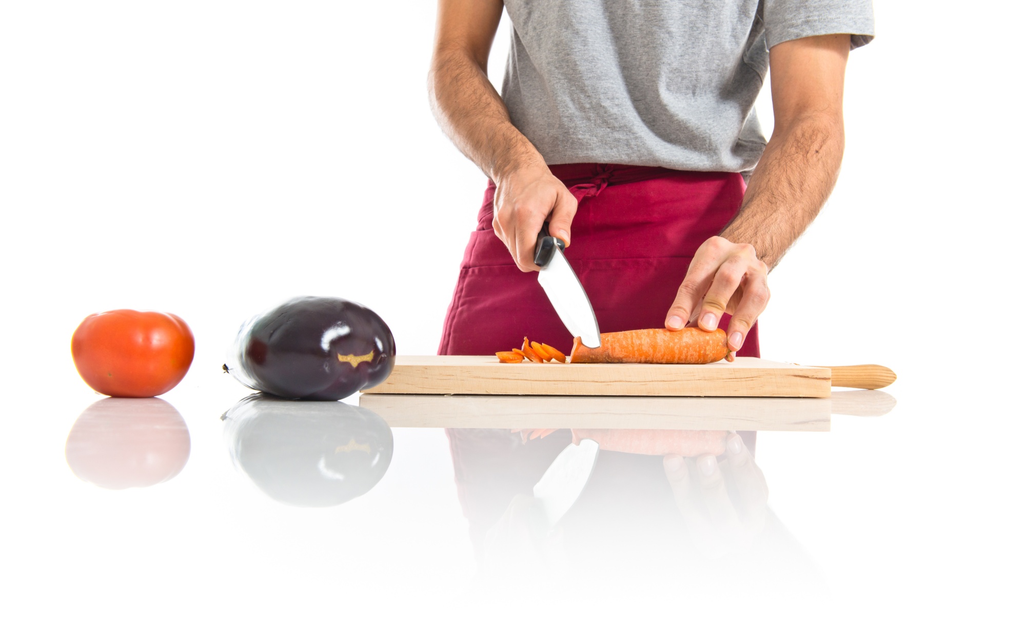 Chef che mostra tecnica di taglio